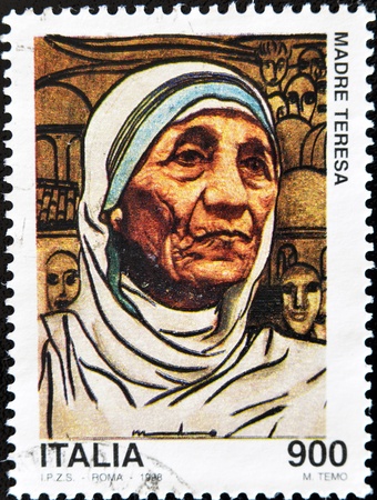 ITALY - CIRCA 1998: A stamp printed in Italy shows Mother Teresa, circa 1998 のeditorial素材