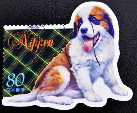 JAPAN - CIRCA 2000: A stamp printed in Japan shows a dog, circa 2000 の写真素材