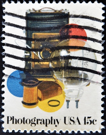 UNITED STATES OF AMERICA -  CIRCA 1978: A stamp printed in USA, shows photo camera, circa 1978の写真素材