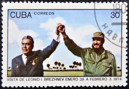 CUBA - CIRCA 1974 : A stamp printed in Cuba show leader of USSR Leonid Brezhnev and Fidel Castro, circa 1974 のeditorial素材