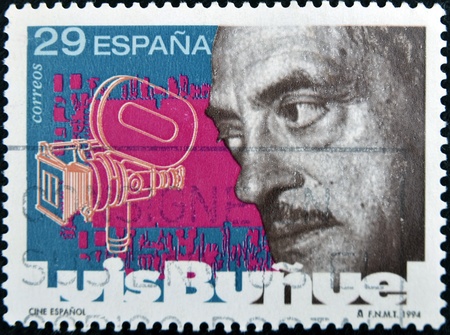 SPAIN - CIRCA 1994: A stamp printed in Spain shows Luis Buñuel, circa 1994 のeditorial素材