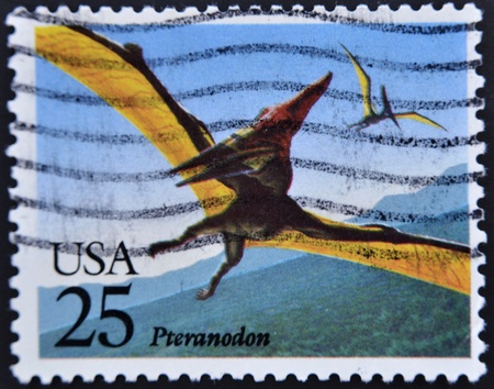UNITED STATES OF AMERICA - CIRCA 1989: A stamp printed in USA shows a Pteranodon, prehistoric animal, circa 1989 の写真素材