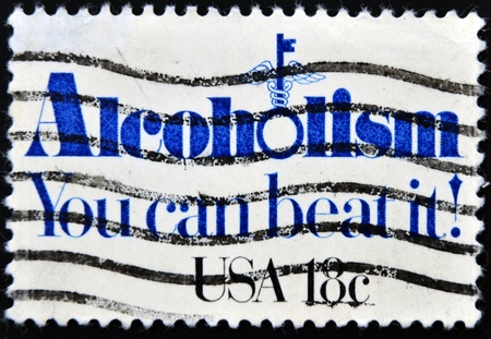 UNITED STATES OF AMERICA- CIRCA 1981: A stamp printed in USA shows slogan - Alcoholism. You can beat...