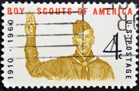 UNITED STATES - CIRCA 1960: A stamp printed in USA, shows Boy scout Giving scout sign, circa 1960 