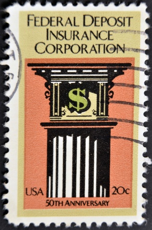 UNITED STATES - CIRCA 1984: A stamp printed in USA shows image commemorating the 50th anniversary of the Federal Deposit Insurance Corporation, circa 1984  の写真素材