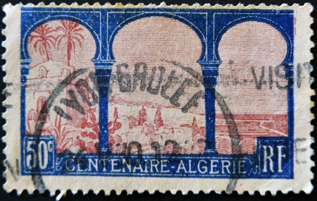 FRANCE - CIRCA 1930: A stamp printed in France commemorates the centenary of the French presence in Algeria, circa 1930の写真素材