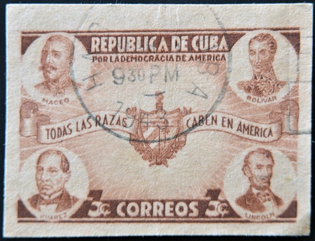 CUBA - CIRCA 1942: A stamp printed in cuba dedicated to democracy in america shows Maceo, Bolivar, Juarez and Lincoln, circa 1942の写真素材