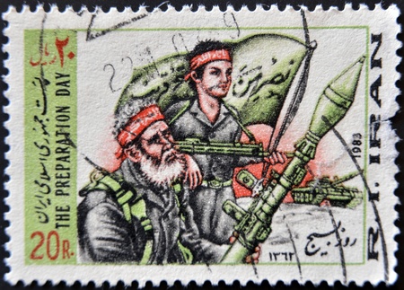 IRAN - CIRCA 1983: A stamp printed in Iran shows the preparation day, war, circa 1983の写真素材