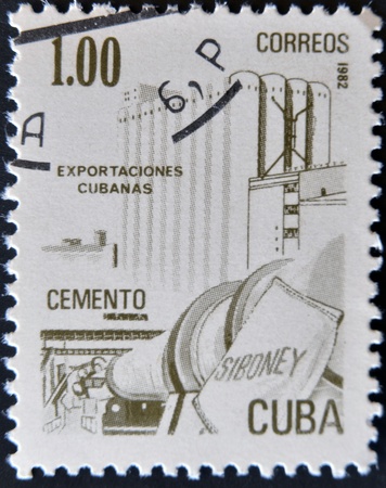 CUBA - CIRCA 1982: A stamp printed in Cuba honored Traditional Cuban exports shows cement, circa 1982の写真素材