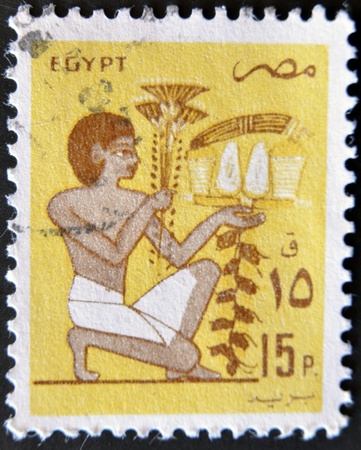 EGYPT - CIRCA 1970: A stamp printed in Egypt shows Egyptian painting, circa 1970の写真素材