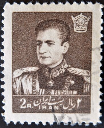 IRAN - CIRCA 1959: A stamp printed in Iran shows Mohammad Reza Pahlavi, circa 1959のeditorial素材