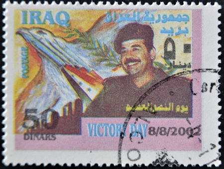 IRAQ - CIRCA 2002: A stamp printed in Iraq shows Saddam Hussein, circa 2002のeditorial素材