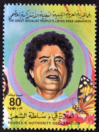 LIBYAN - CIRCA 1995: A Stamp printed in The Great Socialist Peoples Libyan Arab Jamahiriya shows Colonel Muammar Kaddafi, circa 1995 のeditorial素材
