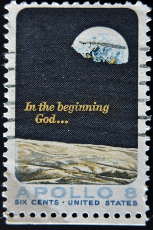 UNITED STATES - CIRCA 1969: A stamp printed in USA shows Moon surface and Earth, circa 1969 の写真素材