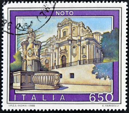 ITALY - CIRCA 1988: A stamp printed in Italy shows Noto, circa 1988の写真素材