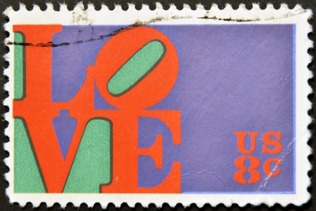 UNITED STATES OF AMERICA - CIRCA 1973: A stamp printed in USA shows the Love by Robert Indiana, circa 1973 の写真素材