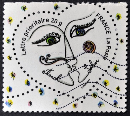 FRANCE - CIRCA 2003: A stamp printed in France shows two people kissing in a heart by Franck...