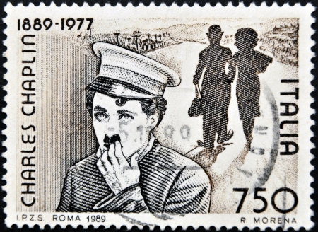 ITALY - CIRCA 1989: Stamp printed by Italy celebrating 100 years from the birth of Charles Chaplin, circa 1989. のeditorial素材