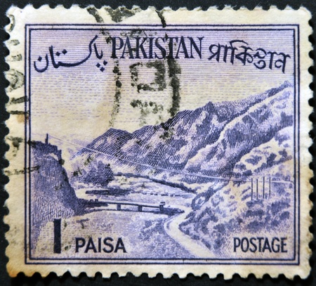 PAKISTAN - CIRCA 1961: A stamp printed in the Pakistan, depicts The Khyber Pass, circa 1961 の写真素材