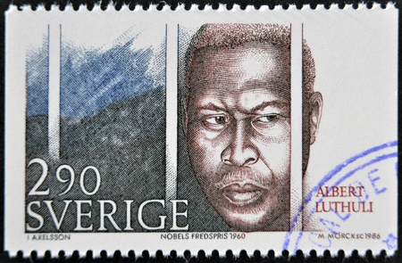SWEDEN - CIRCA 1986: A stamp printed in Sweden dedicated to Nobel Peace, shows Albert Lutheli, circa 1986のeditorial素材