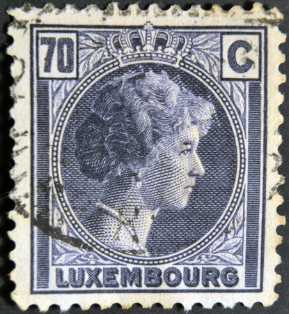 LUXEMBOURG - CIRCA 1944: A stamp printed in Luxembourg, shows Charlotte, Grand Duchess of Luxembourg, circa 1944 のeditorial素材