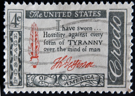 USA - CIRCA 1960 : A stamp printed in the USA shows Credo I have sworn...Hostility against every form of Tyranny over the mind of man, circa 1960 のeditorial素材