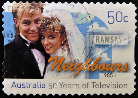AUSTRALIA - CIRCA 1985: A stamp printed in Australia shows frame from the movie Neighbours, circa 1985 のeditorial素材