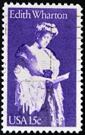 UNITED STATES OF AMERICA - CIRCA 1980: a stamp printed in USA shows Edith Wharton, writer, circa 1980 のeditorial素材