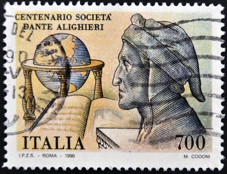 ITALY - CIRCA 1990: A stamp printed in Italy dedicated to centenary of Dante Alighieri Society, circa 1990のeditorial素材