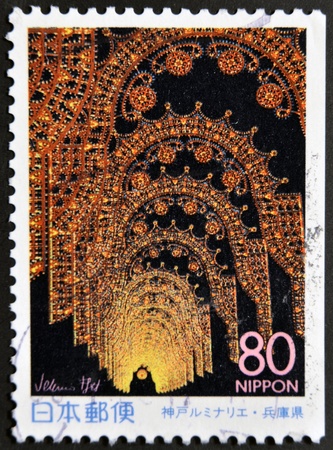 JAPAN - CIRCA 1998: A stamp printed in Japan shows Kobe Luminarie, circa 1998のeditorial素材