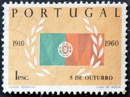 PORTUGAL - CIRCA 1960: A stamp printed in Portugal shows flag, circa 1960のeditorial素材
