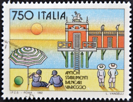 ITALY - CIRCA 1992: A stamp printed in Italy shows former summer resort, circa 1992のeditorial素材
