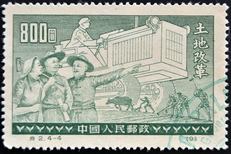 CHINA - CIRCA 1955  A stamp printed in China shows Land Reform, circa 1955 のeditorial素材