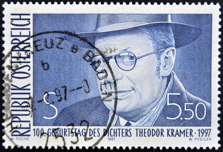 AUSTRIA - CIRCA 1997: A stamp printed in Austria shows Theodor Kramer, circa 1997のeditorial素材