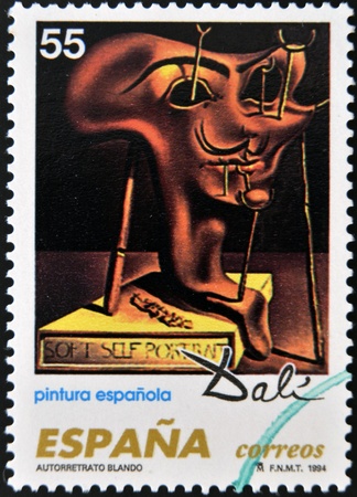 SPAIN - CIRCA 1994: A stamp printed in Spain shows work by Salvador Dali, circa 1994のeditorial素材