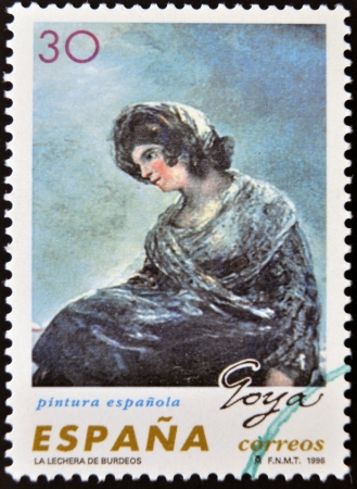 SPAIN - CIRCA 1996: A stamp printed in spain shows The Milkmaid of Bordeaux by Francisco de Goya, circa 1996のeditorial素材