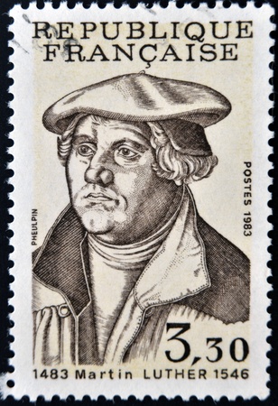 FRANCE - CIRCA 1983: A stamp printed in France shows Martin Luther, circa 1983のeditorial素材