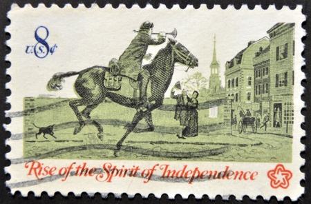 UNITED STATES OF AMERICA - CIRCA 1973  A Stamp printed in USA shows the Postrider, from the series  Rise of the Spirit of Independence , circa 1973 の写真素材