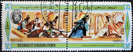 YEMEN - CIRCA 1970  A stamp printed in Yemen shows visit of the Queen of Sheba to King Solomon, circa 1970のeditorial素材