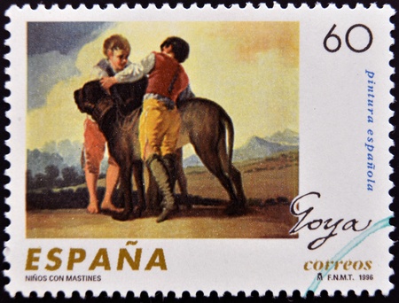 SPAIN - CIRCA 1996: A stamp printed in Spain shows Children with hounds by Francisco de Goya, circa 1996のeditorial素材