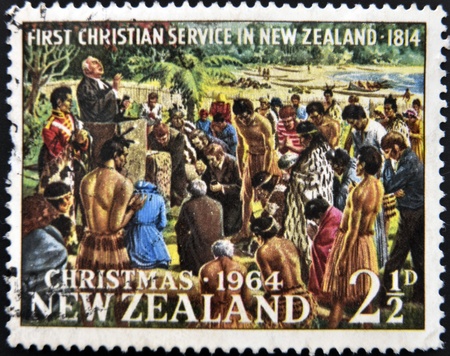 NEW ZEALAND - CIRCA 1964: A stamp printed in New Zealand shows first christian service in New Zealand - 1814, circa 1964の写真素材