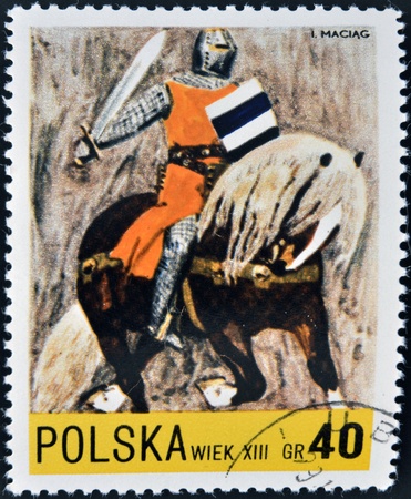 POLAND - CIRCA 1972: A stamp printed in Poland dedicated to Polish horse riding, shows Rider (13th century), circa 1972 のeditorial素材