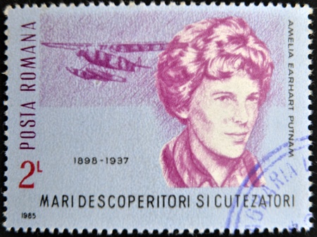 ROMANIA - CIRCA 1985: A stamp printed in romania shows Amelia Earhart Putnam, circa 1985のeditorial素材
