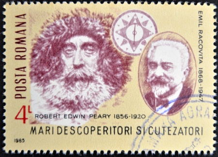 ROMANIA - CIRCA 1985: A stamp printed in Romania shows Robert Edwin Peary and Emil Racovita, circa 1985のeditorial素材