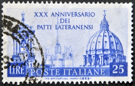 ITALY - CIRCA 1959: A stamp printed in Italy dedicated to xxx anniversary of the Lateran Treaty, circa 1959のeditorial素材