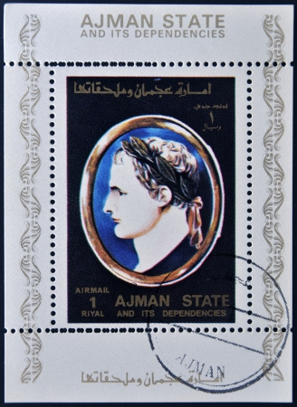 AJMAN STATE - CIRCA 1975: A stamp printed in United Arab Emirates (UAE) shows Julius Caesar, Emperor of Rome, circa 1975のeditorial素材