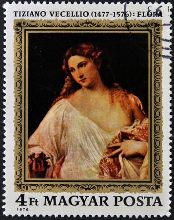 HUNGARY - CIRCA 1976: A stamp printed in Hungary shows Flora, representation of the Renaissance ideal of beauty, by Tiziano, circa 1976 の写真素材