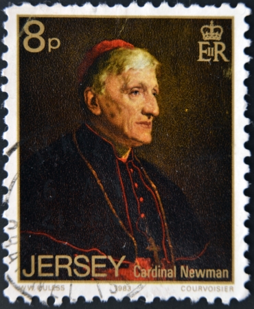 JERSEY - CIRCA 1983: A stamp printed in Jersey shows Cardinal Newman, circa 1983のeditorial素材