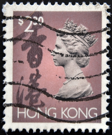 HONG KONG - CIRCA 1994: A stamp printed in Hong Kong shows Portrait of Queen Elizabeth, circa 1994. のeditorial素材