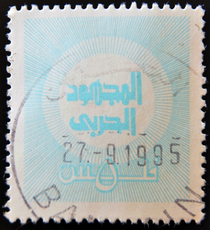 BAHRAIN - CIRCA 1990  A stamp printed in Bahrain shows in-script Art of War in center, circa 1990 のeditorial素材